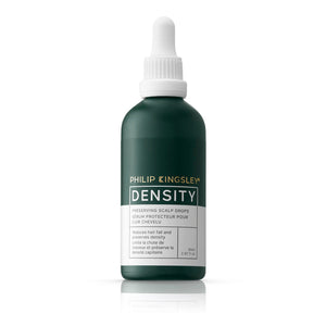 Bottle of Philip Kingsley Density product on a white background
