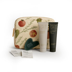 Irene Forte skincare products including a pouch with fruit design on a white background