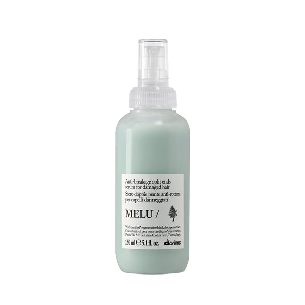 A white plastic spray bottle of Pride & Groom Dog Days De-Tangling Coat Spray for all dogs, featuring a label with reddish-brown hair imagery and white text, on a solid white background.