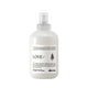 White hair care product bottle with 'LOVE' branding on a white background