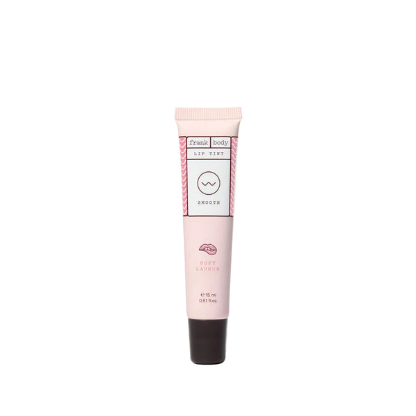 Pink lip balm tube with brand logo on a white background
