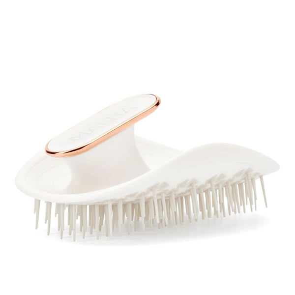 A white Tangle Teezer Detangling Hairbrush with rose gold trim and a white handle, shown on a clean white background.