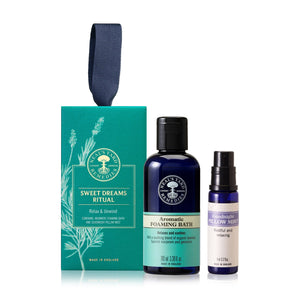 Three bottles of Neal's Yard Remedies with a green box labeled 'Sweet Dreams Ritual' on a white background.