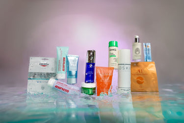 Collection of skincare products on water