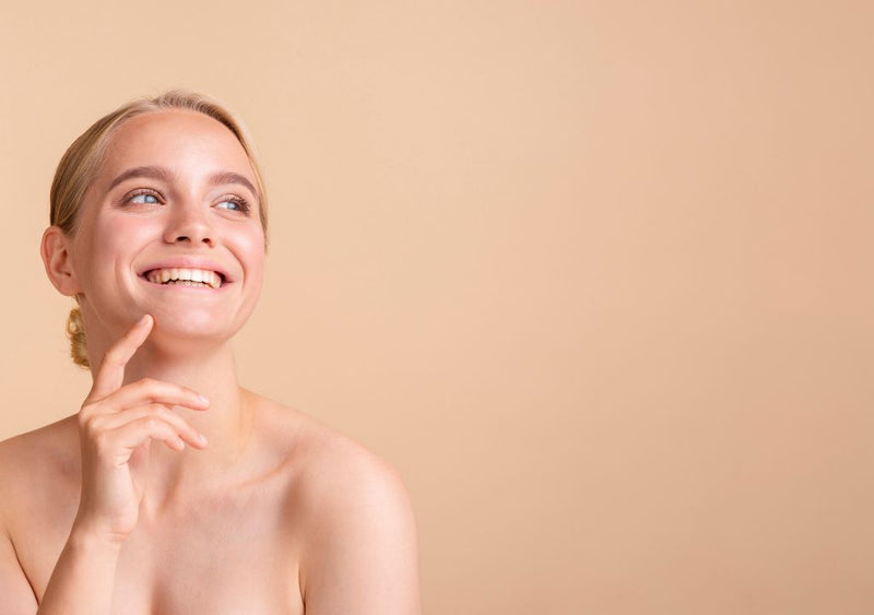 Smiling girl with flawless skin