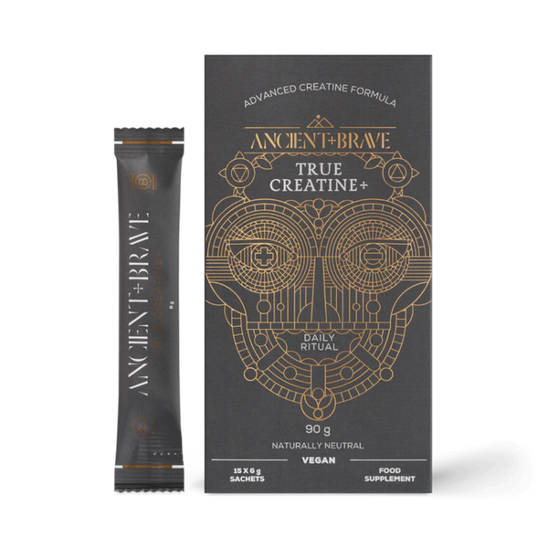 Ancient + Brave True Creatine+ vegan food supplement, showing a single black sachet packet next to its black and gold outer box packaging on a white background.