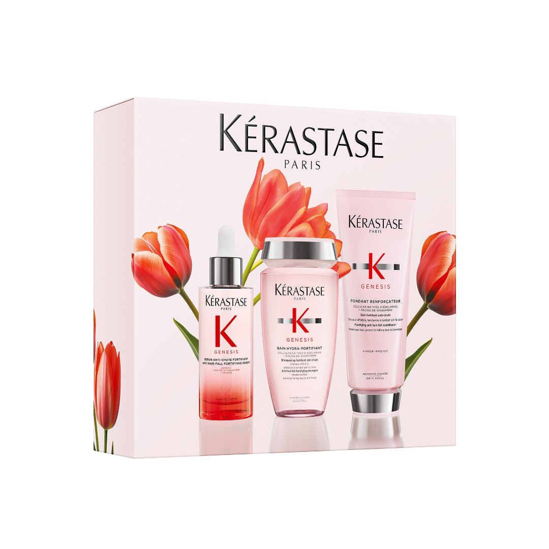 Kérastase product set with bottles and packaging on a white background