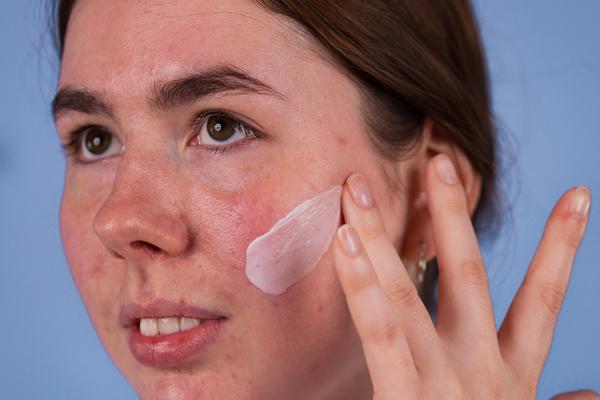 a women applying Proto-col Intense Hydration Night Cream to her face