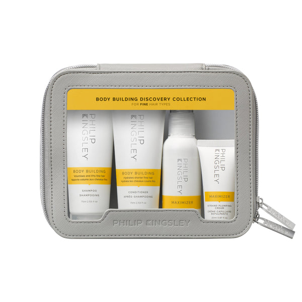 Philip Kingsley Body Building Discovery Collection for fine hair in a light gray zippered pouch, containing four white hair care bottles and tubes with yellow accents.
