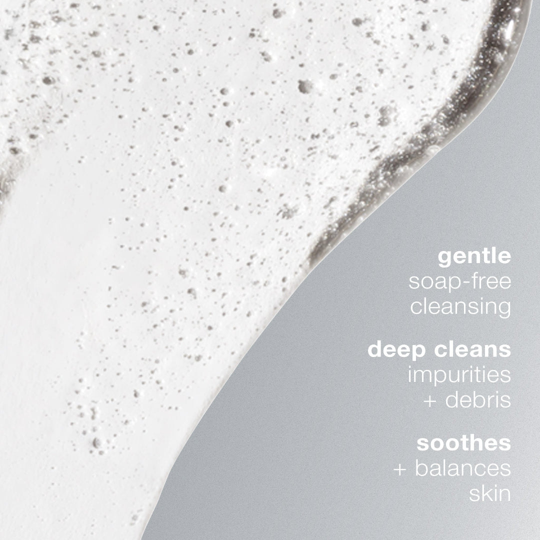 Foamy cleansing product with text describing its benefits on a gray background