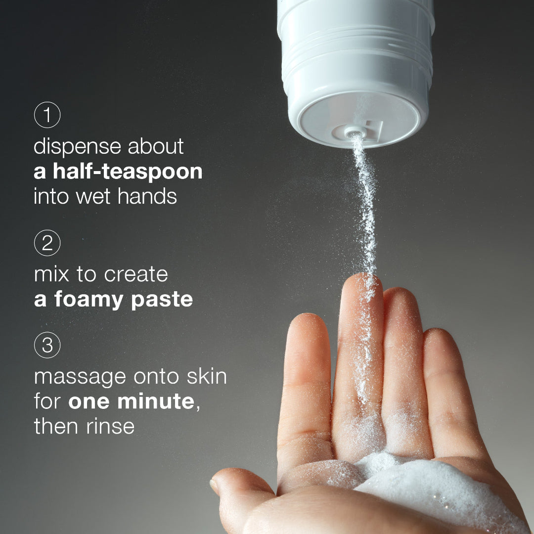 Hand using a white container to dispense a foamy paste onto wet hands with text instructions.