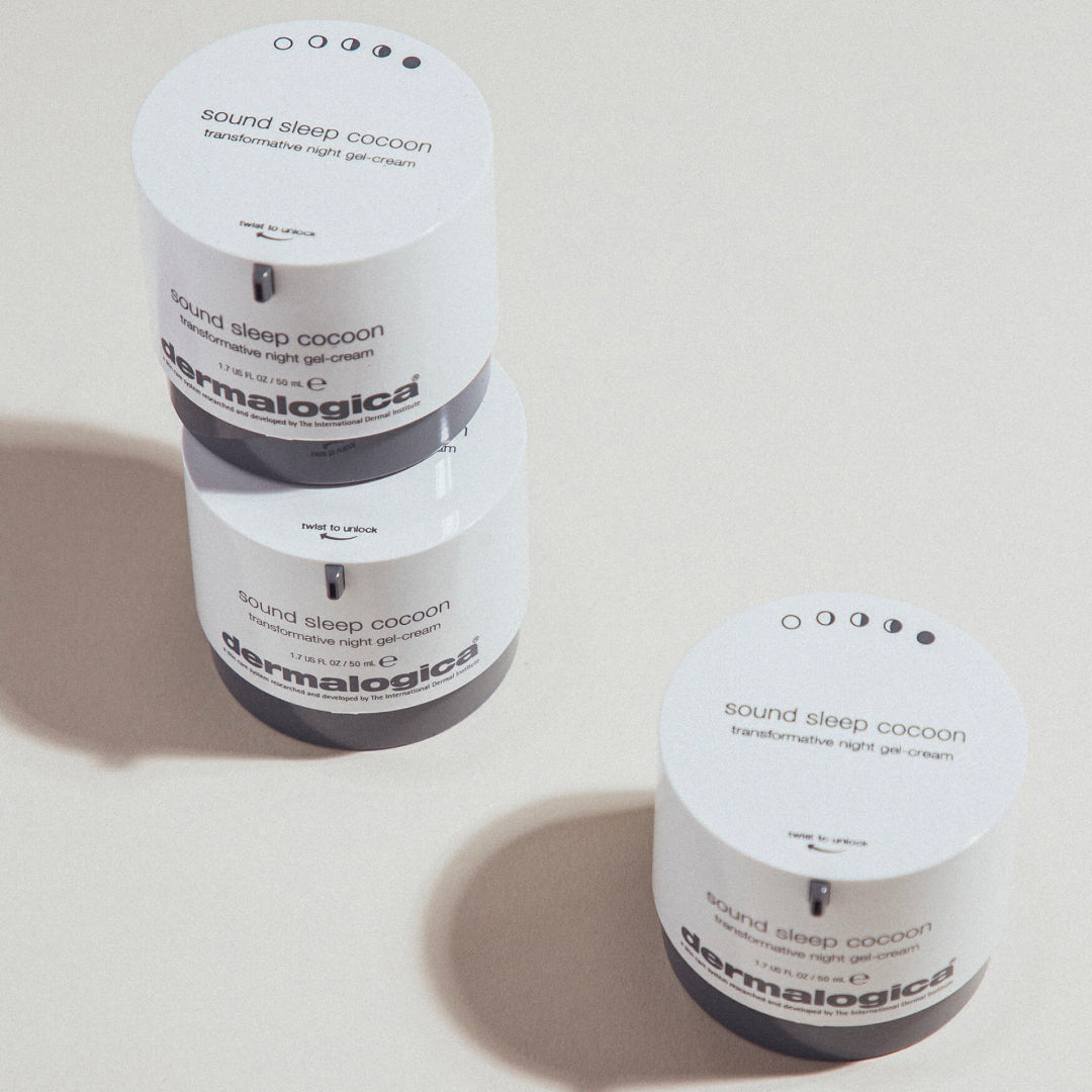 Three jars of Dermalogica 'sound sleep cocoon' cream on a light background