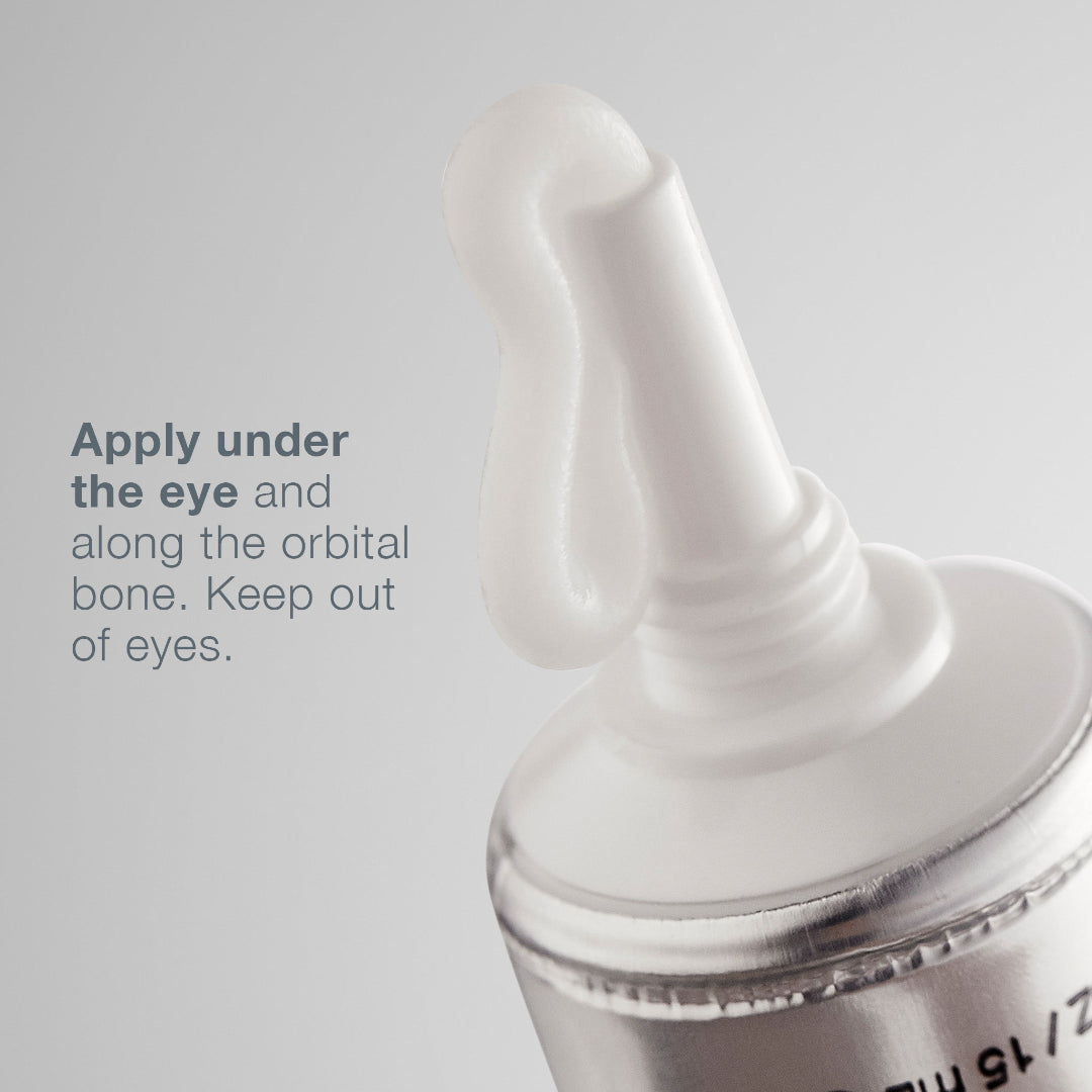 Close-up of a skincare product with text on a gray background