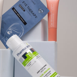 Pharmaceris skincare products including a bottle, sachet, and tube on a white surface with a gray background.