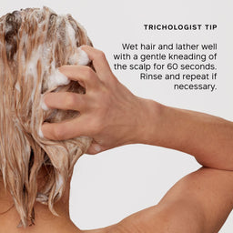 Person washing hair with a trichologist tip on a white background