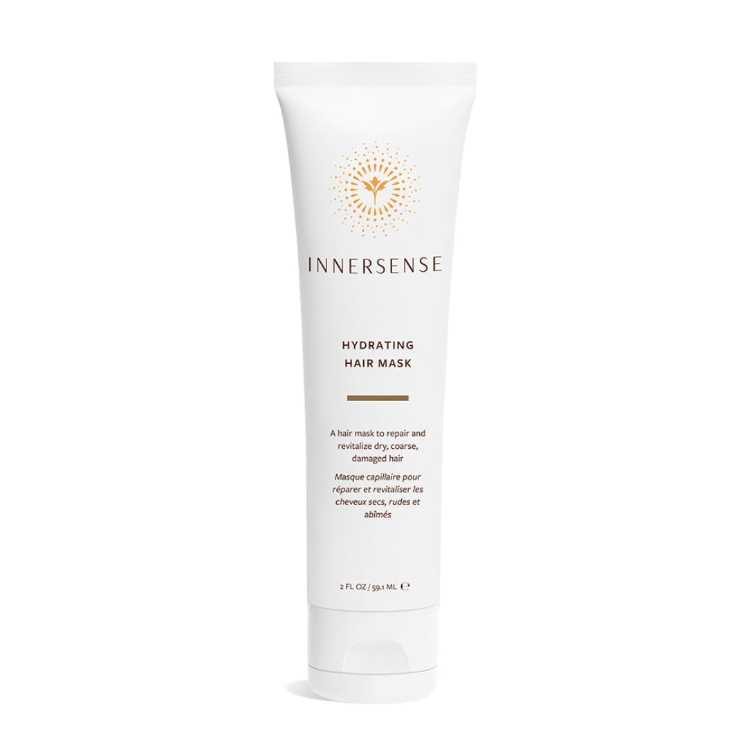 A white tube of Innersense Hydrating Hair Mask with gold and brown text and logo, set against a plain white background.