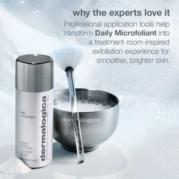 Dermalogica Daily Microfoliant skincare set featuring a white and silver spray bottle, a stainless steel bowl filled with exfoliating powder, and an applicator brush, set against a snowy white background with promotional text.
