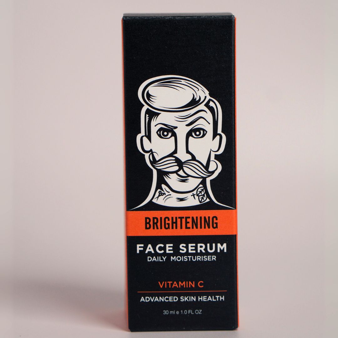 Box of brightening face serum with a stylized face illustration on a light gray background