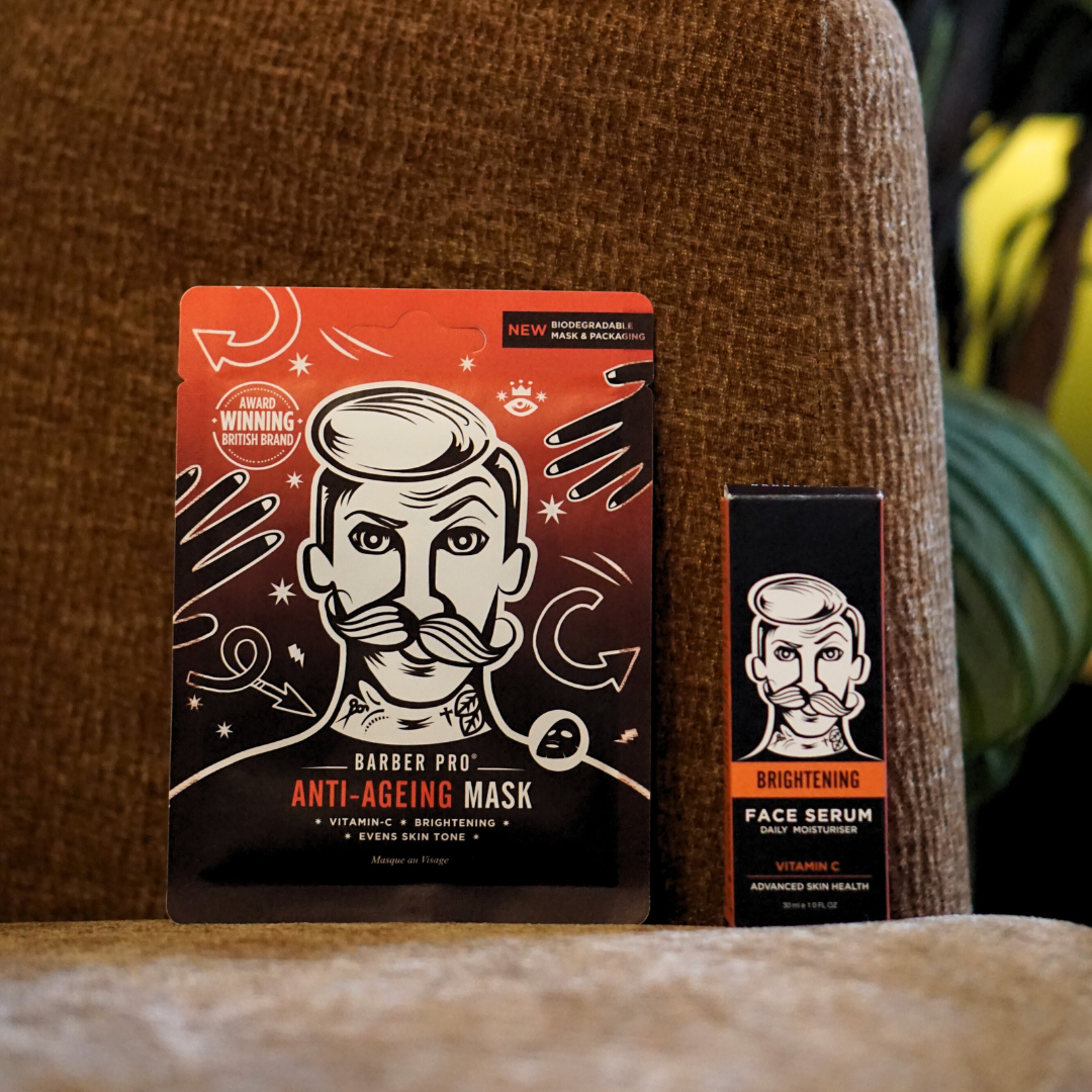 Two skincare product boxes, one for an anti-ageing mask and the other for a face serum, on a brown textured surface.