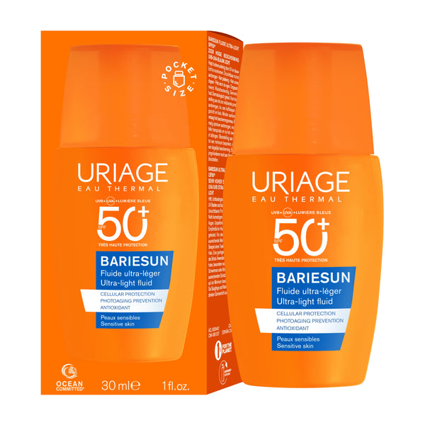 A bottle and matching box of URIAGE Eau Thermal Bariesun 50+ sunscreen, featuring a vibrant orange design with white and blue text.