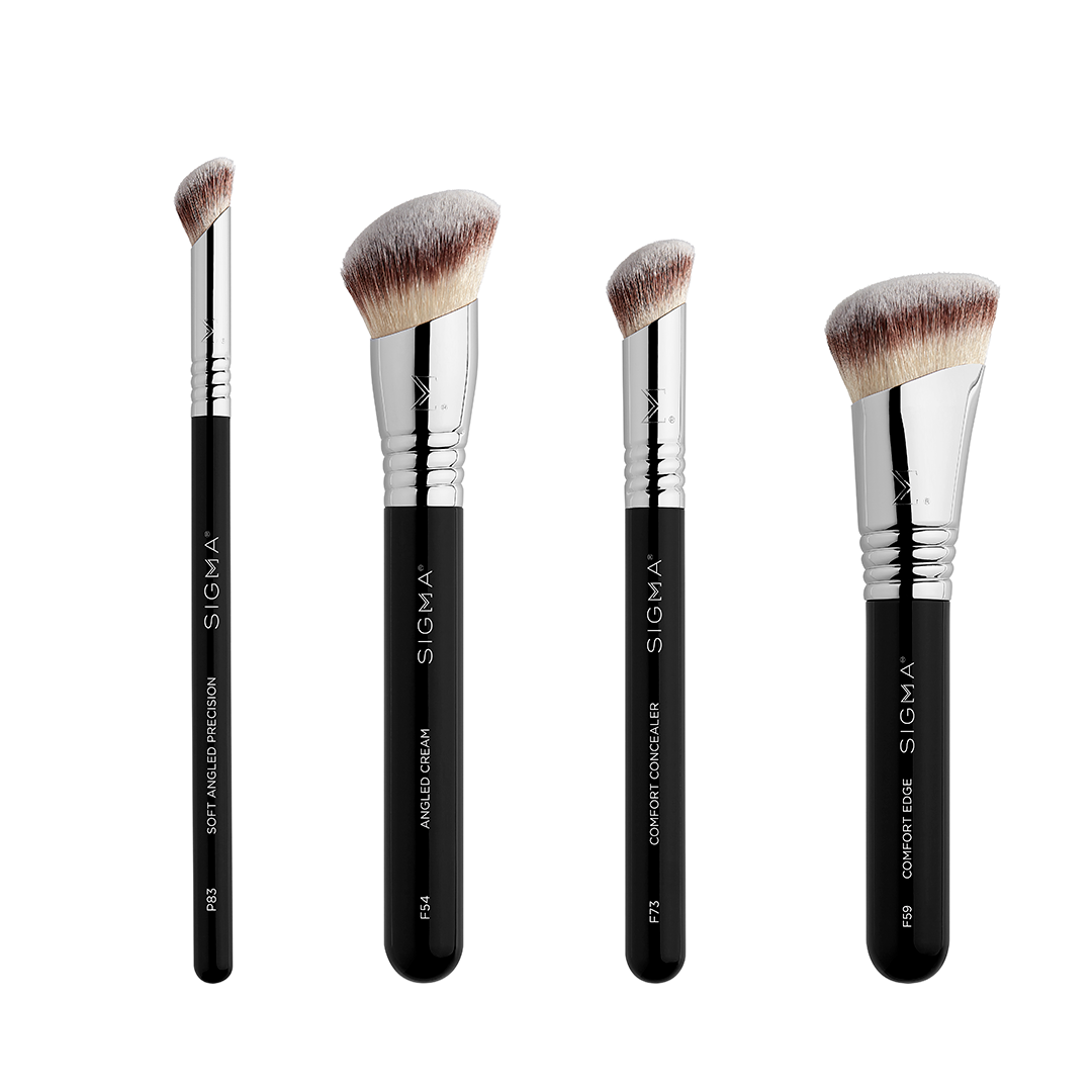 Set of four Sigma makeup brushes on a white background