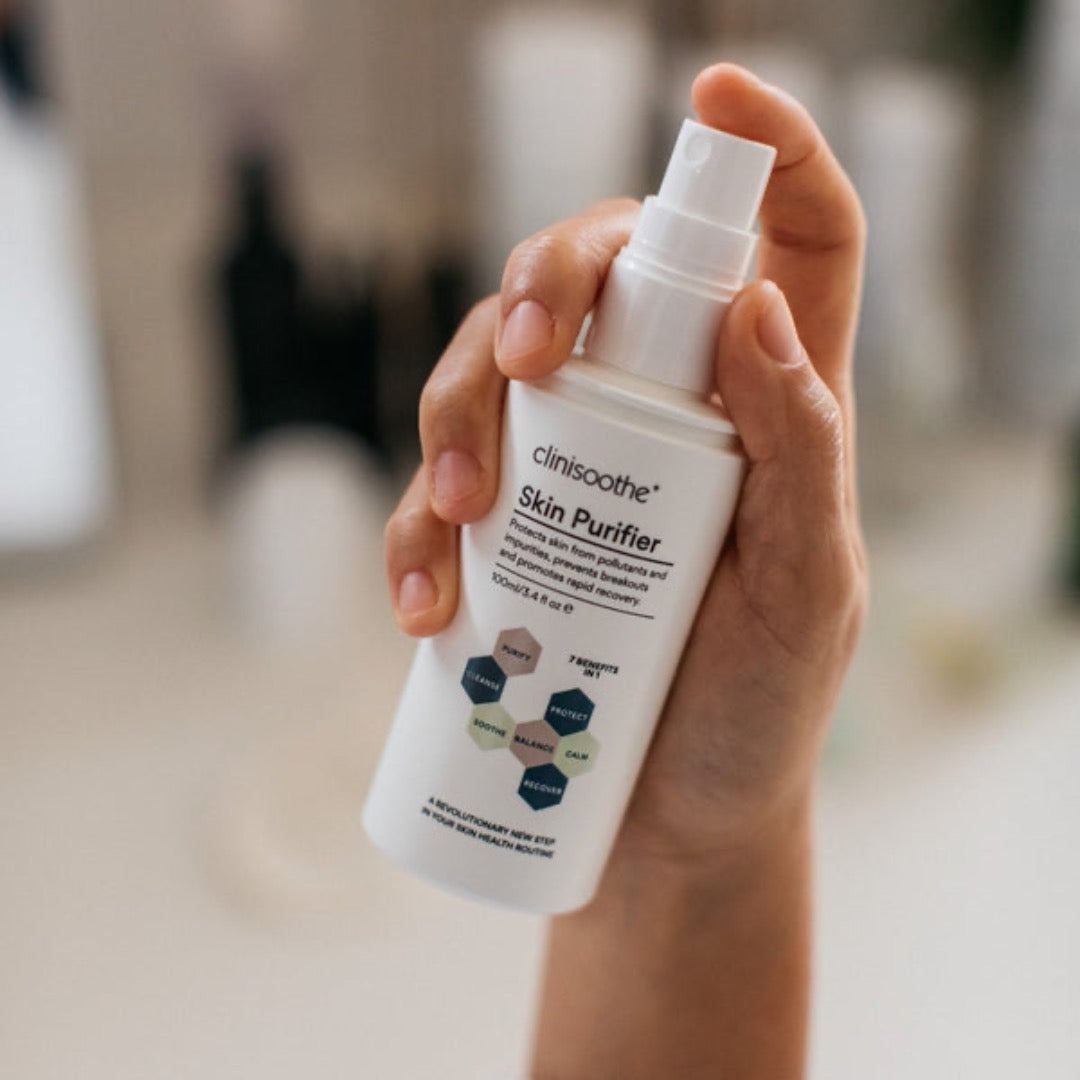 Clinisoothe+ Skin Purifier Spray Bottle held in a hand