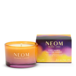 NEOM Cosy Nights scented candle with packaging on a white background