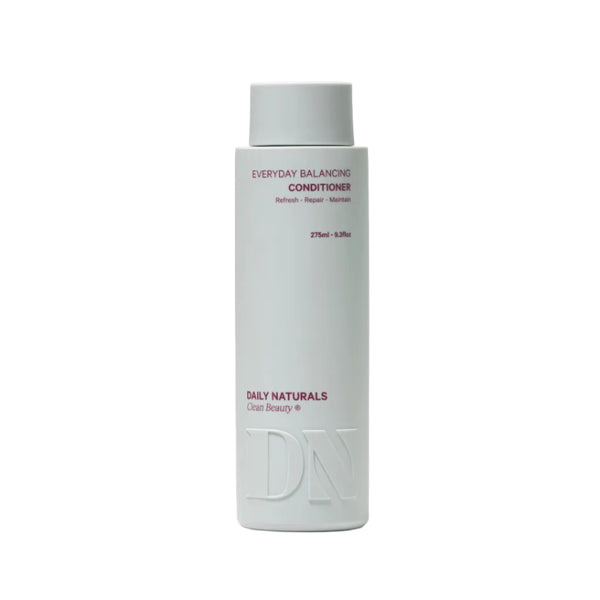 Conditioner bottle labeled 'Everyday Balancing Conditioner' by 'Daily Naturals' on a light gray background
