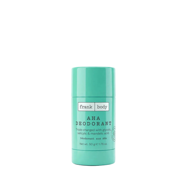 A mint green deodorant stick by frank body, labeled 'AHA DEODORANT', centered on a light gray background.