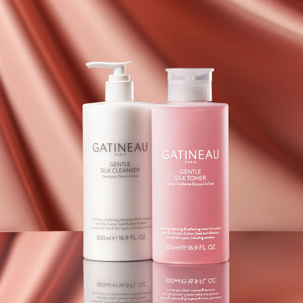 Two Gatineau skincare products on a red and orange gradient background