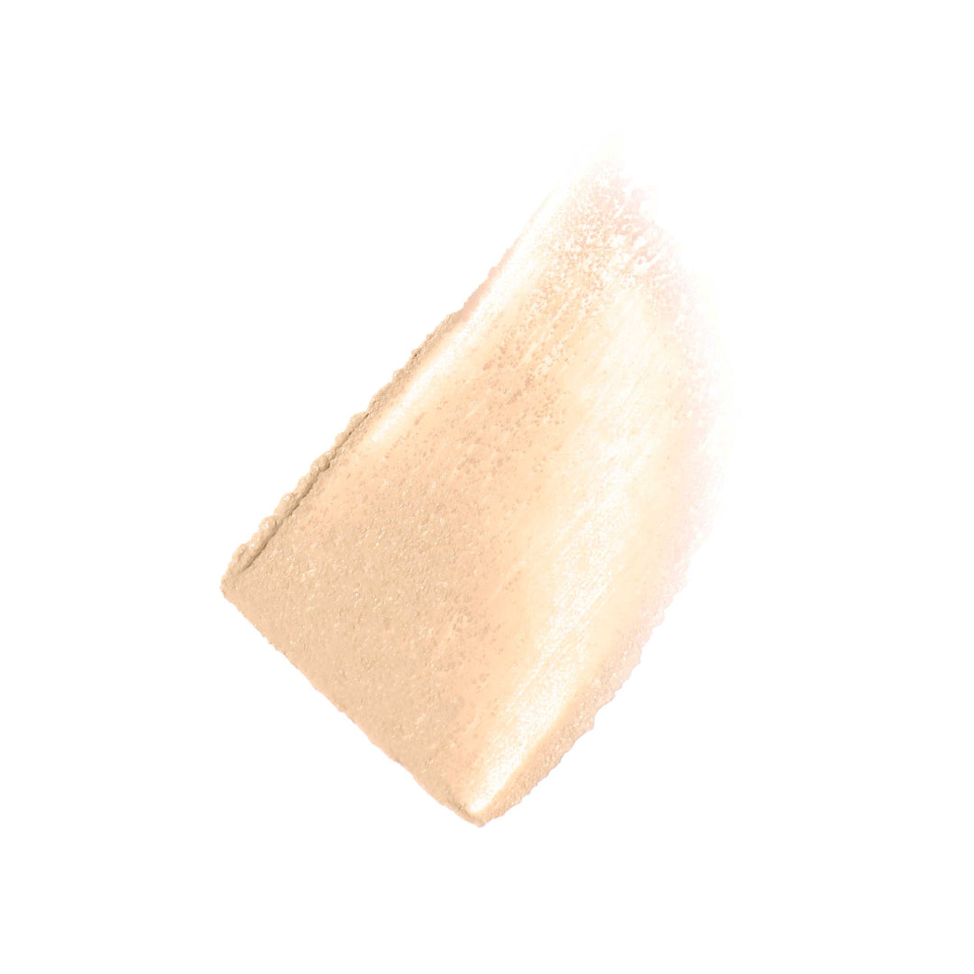 Beige cosmetic product on a white background