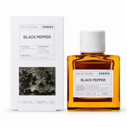 A bottle of Korres Black Pepper Eau De Toilette with amber liquid and a white cap, shown next to its white packaging box on a clean white background.
