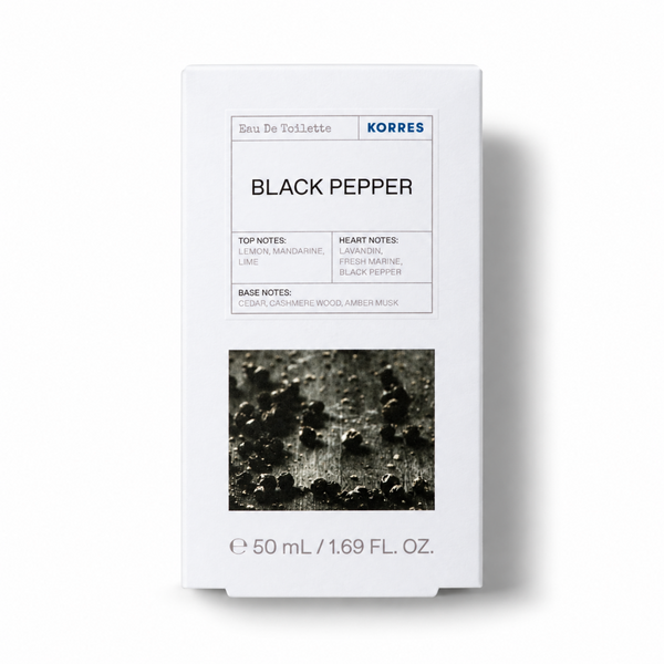 A white rectangular box of KORRES Black Pepper Eau De Toilette, featuring black text and a dark textured graphic of black pepper crystals on the front, set against a clean white background with a soft shadow.