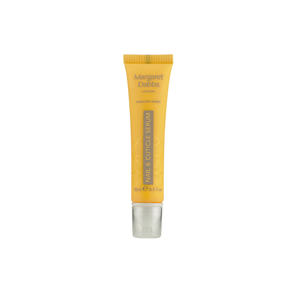 Yellow tube of nail cuticle serum with silver base on a white background