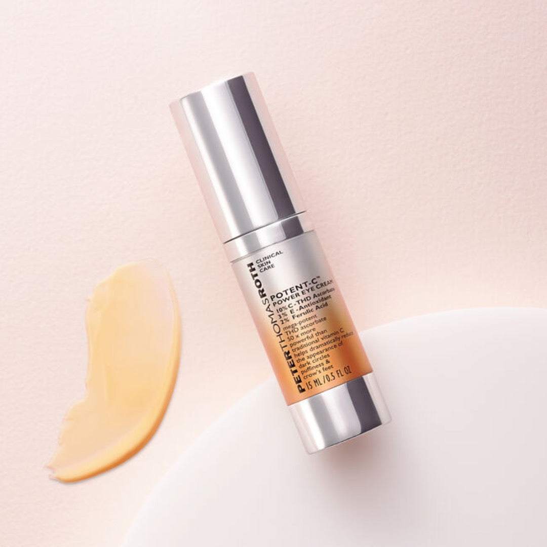 Peter Thomas Roth Potent-C Power Eye Cream bottle with a smudge of texture