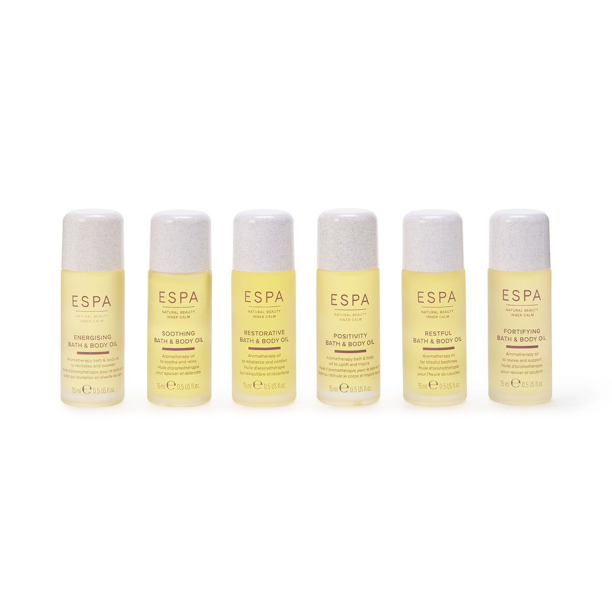 Set of six ESPA bath and body oils on a white background