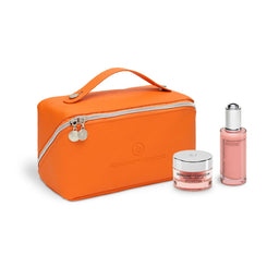 Orange cosmetic bag with a pink skincare product on a white background