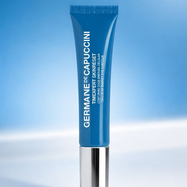 Blue skincare tube with silver base on a light blue background