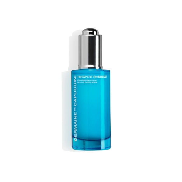 Blue skincare serum bottle with silver cap on a white background