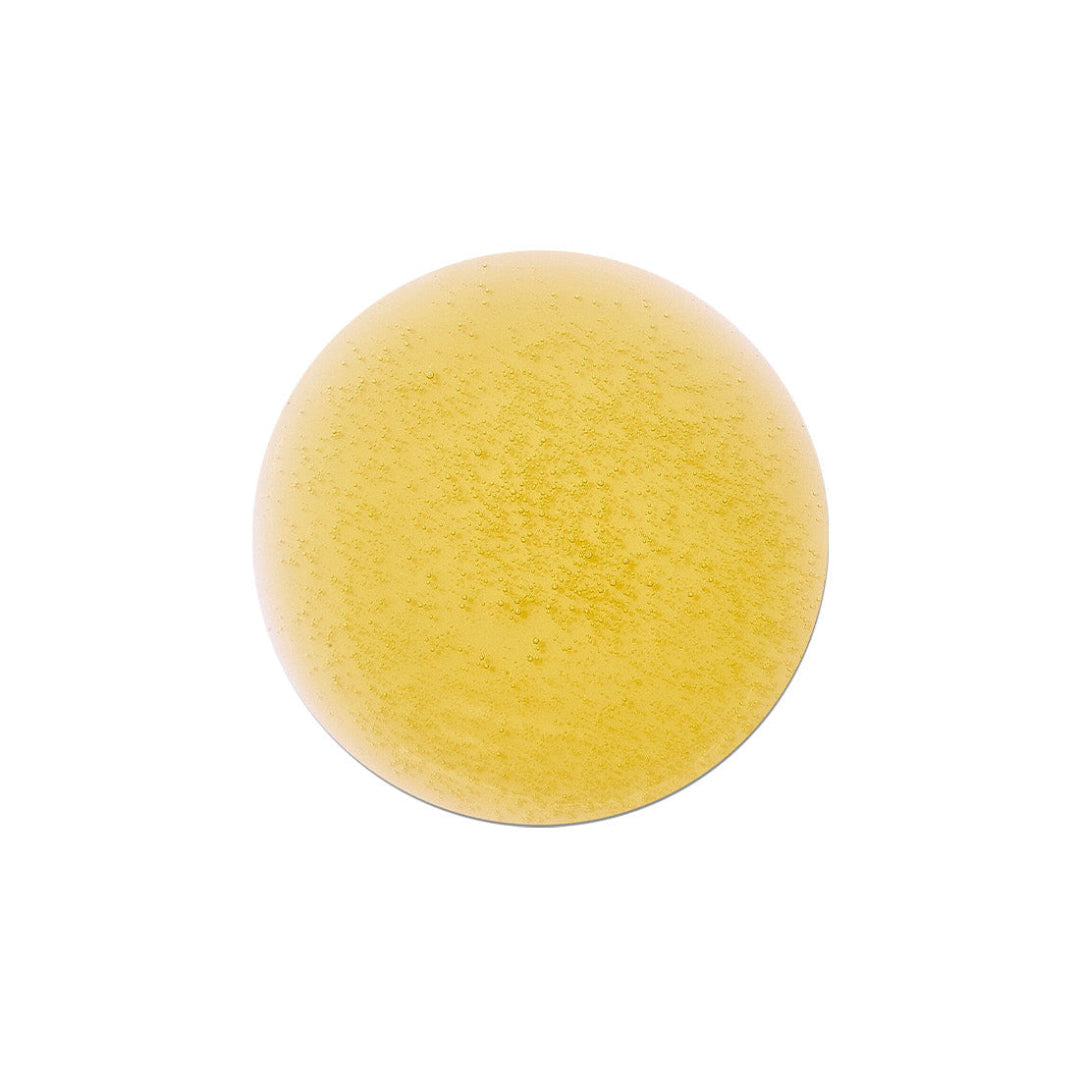 Yellow stress ball on a white background