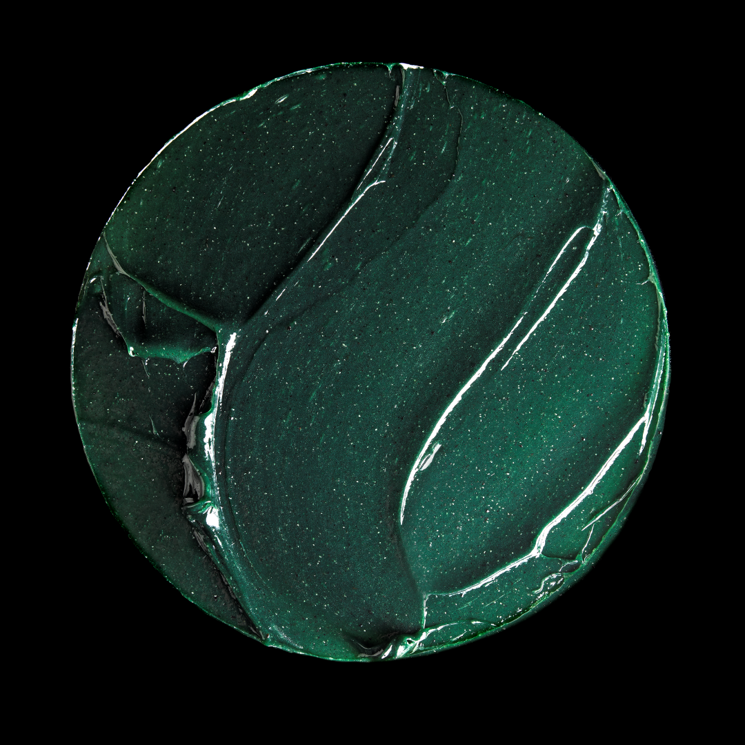 A circular close-up of a dark green textured surface with glossy, swirled patterns and fine reflective highlights, shown against a solid black background.