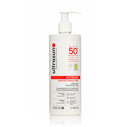 Ultrasun sunscreen bottle with pump on a white background