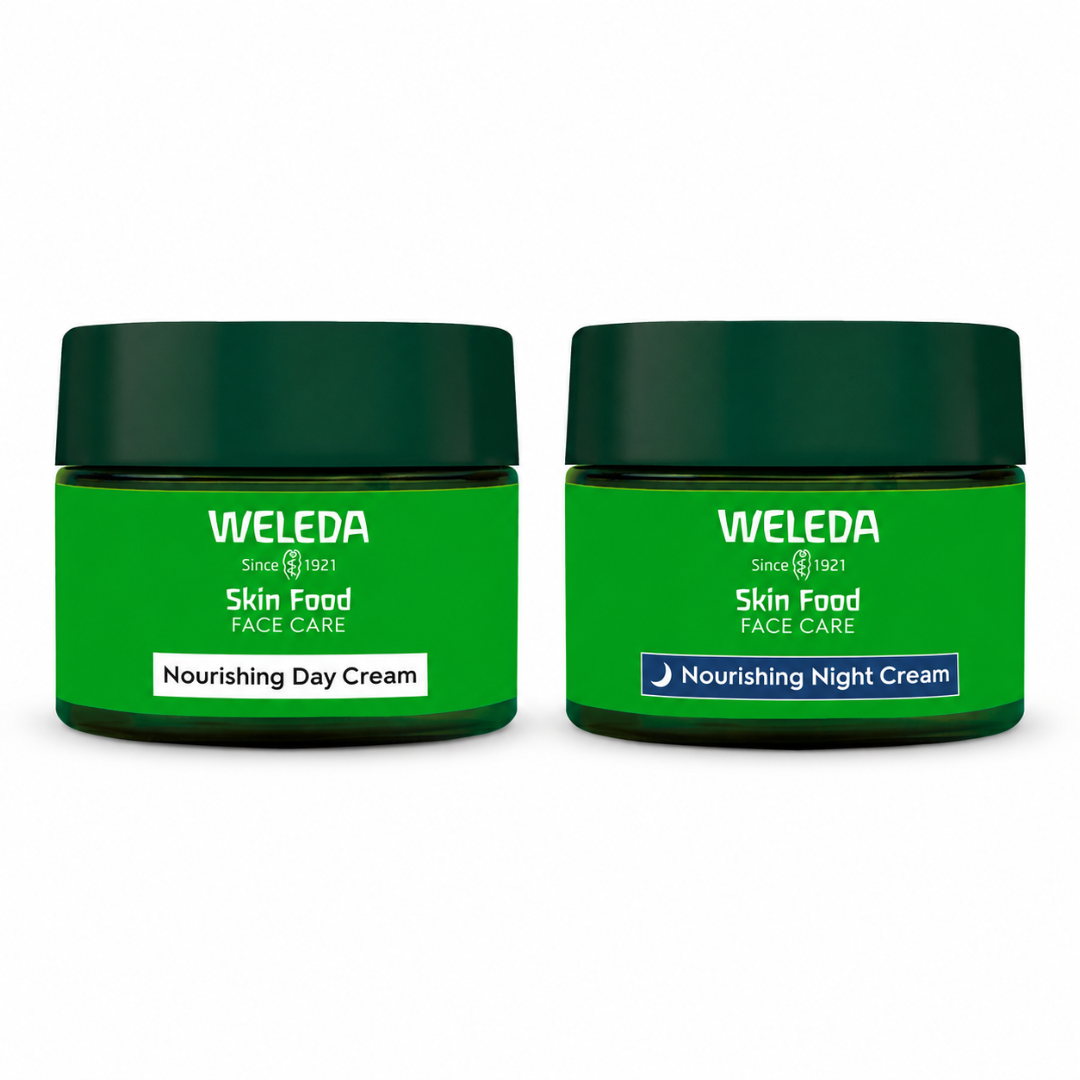 Two Weleda Skin Food Face Care cream jars side by side on a white background. The left jar is labeled 'Nourishing Day Cream' with a white label, and the right jar is labeled 'Nourishing Night Cream' with a blue label.