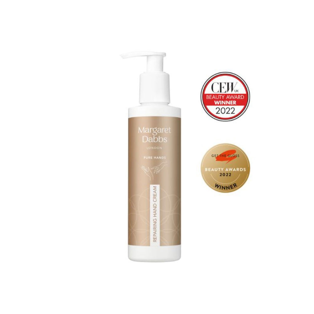 Margaret Dabbs hand cream with awards on a white background