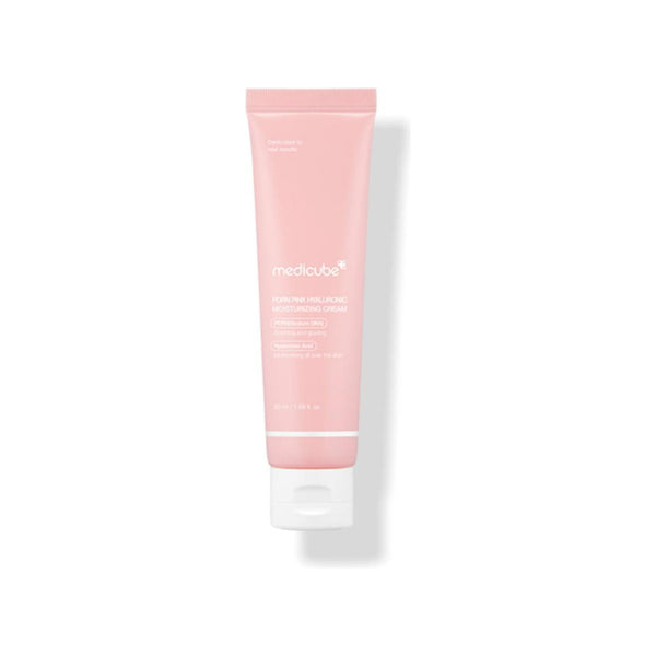 Pink tube of medicube cream on a white background