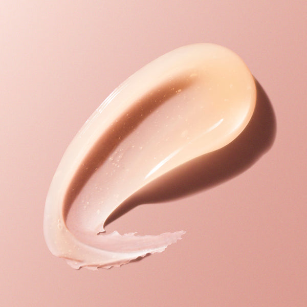 Beige cream swatch on a pink background