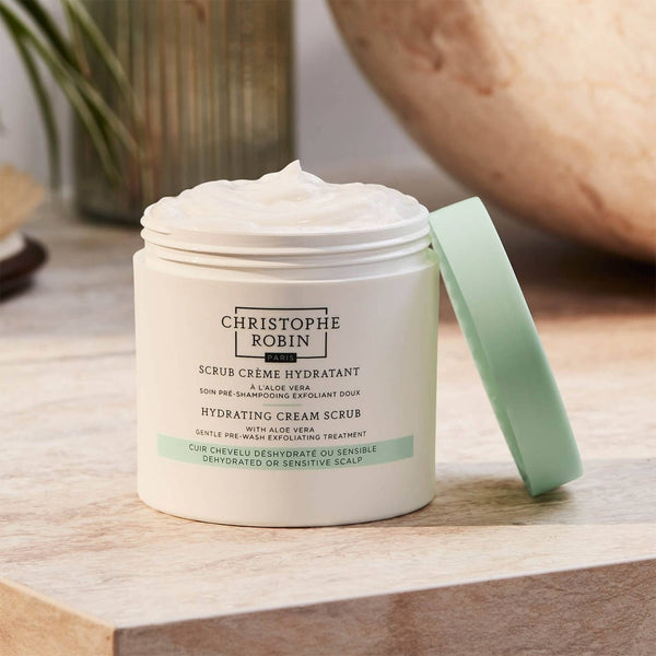 Christophe Robin Hydrating Cream Scrub With Aloe Vera tub with an open lid